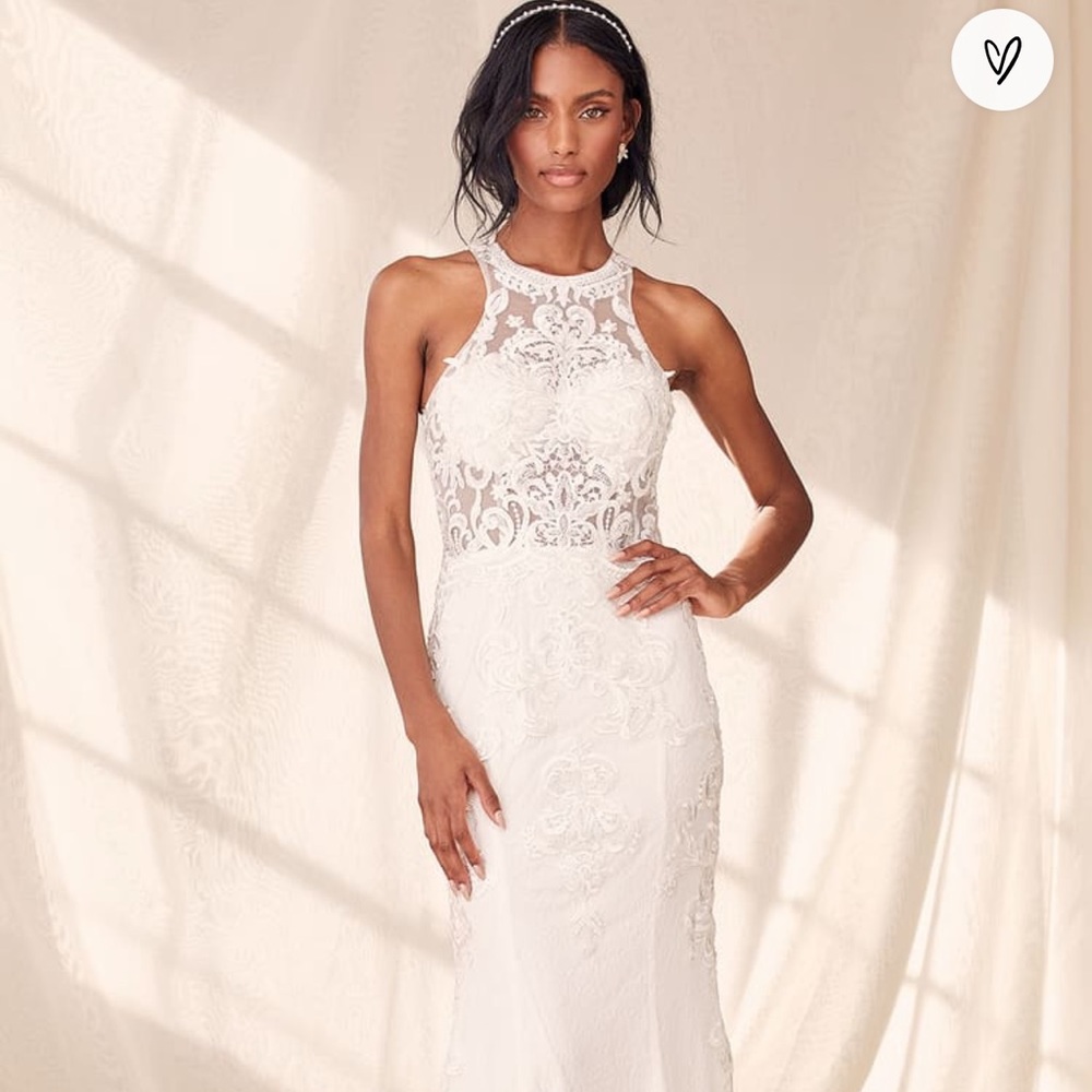 Beautiful “This Magic Moment white lace bead mermaid dress” from Lulu’s